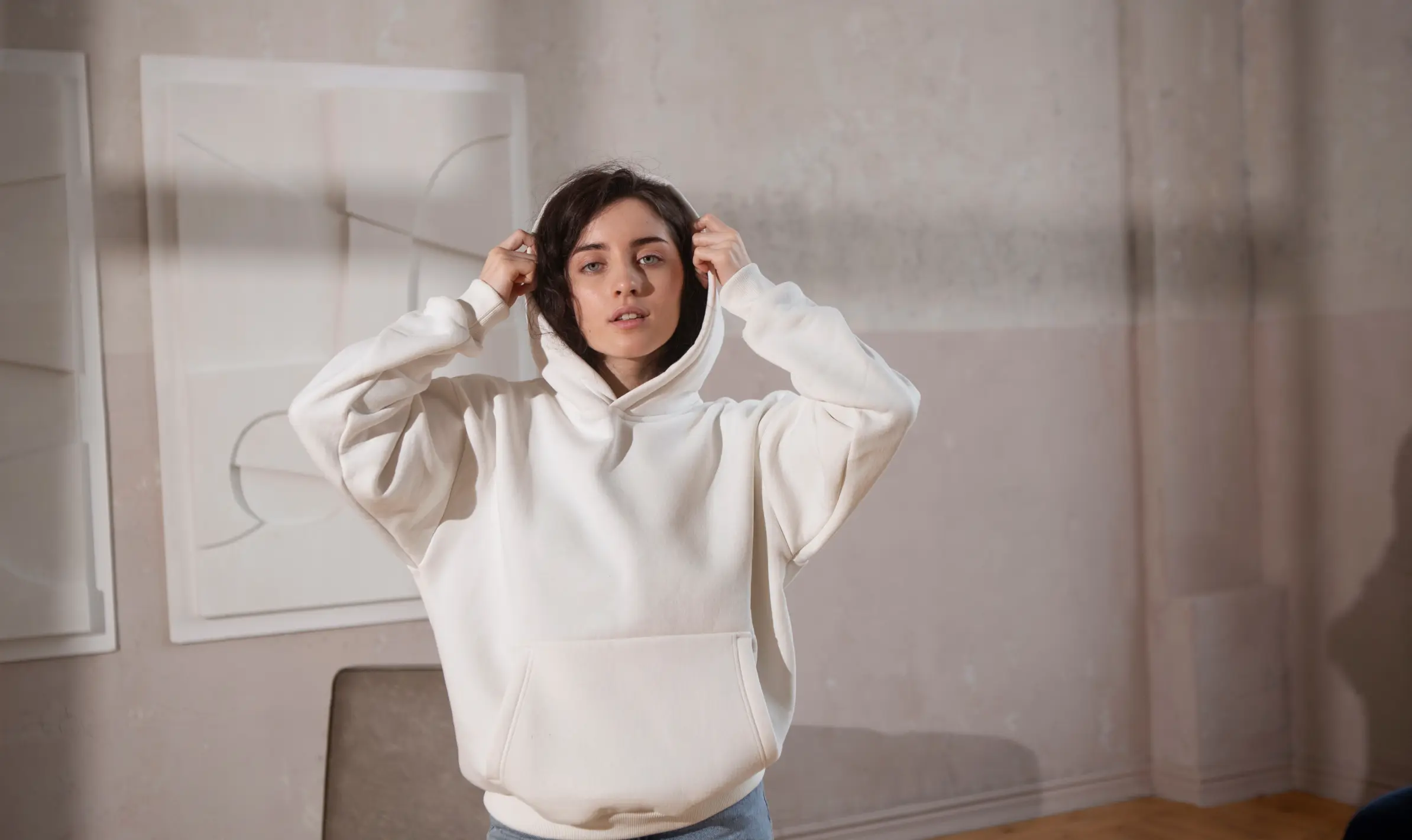 A girl wearing white hoodie