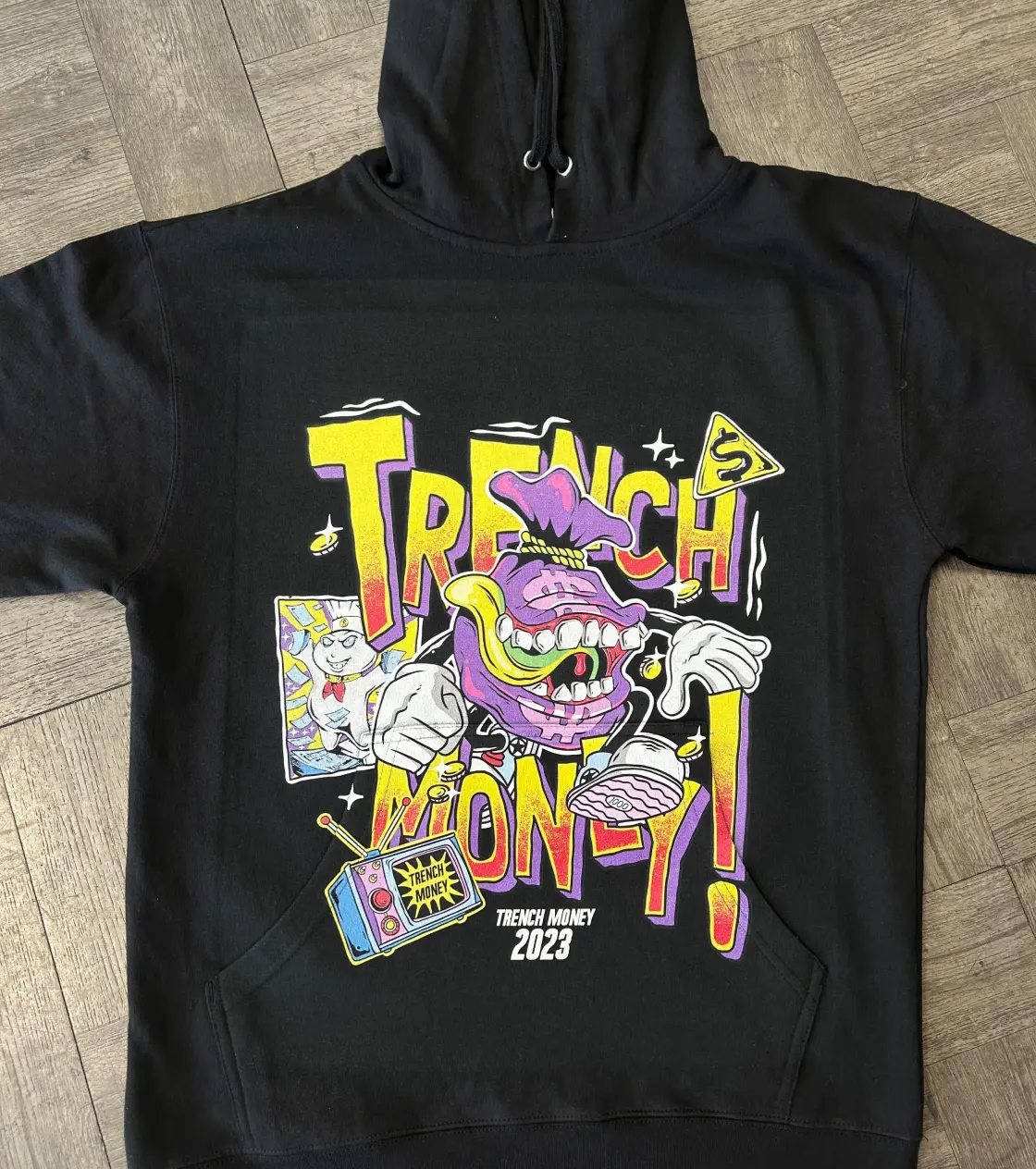 Black hoodie with colorful print on it
